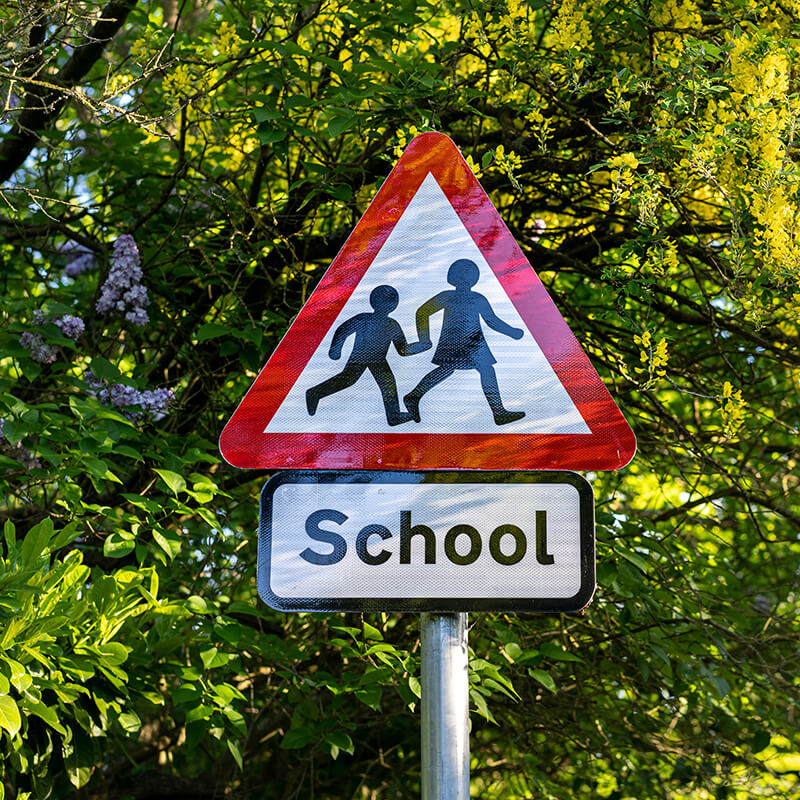 School crossing patrol road sign - what to do - Driving Test Success